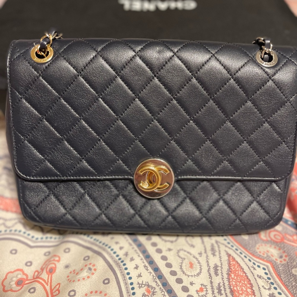 Authentic Chanel bag . This chic shoulder bag is crafted of black calfskin